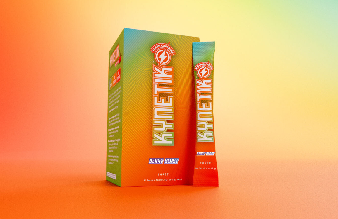 Kynetik Berry Blast clean hydrating energy drink featuring the product box and single stick pack with natural caffeine and electrolytes.