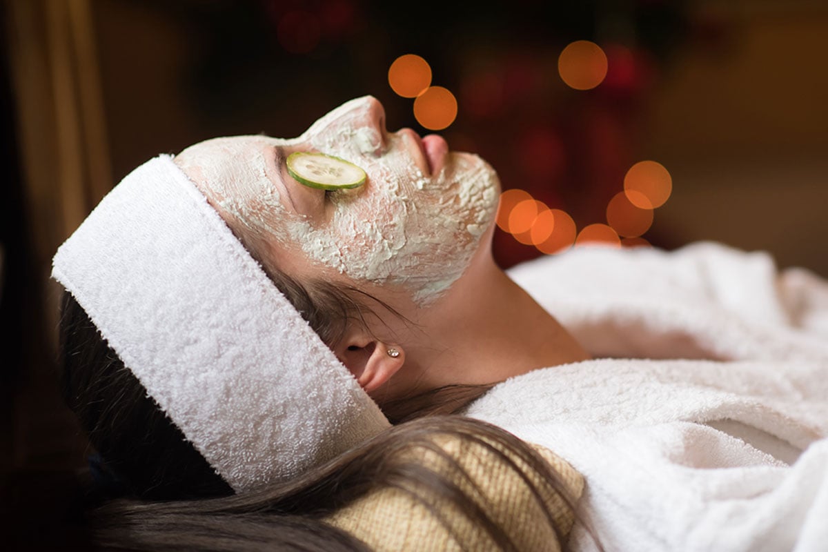 a woman relaxing while using Visage Pure Cleanse as a face mask